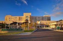 Alaska Native Medical Center Building, surrounded by blue sky